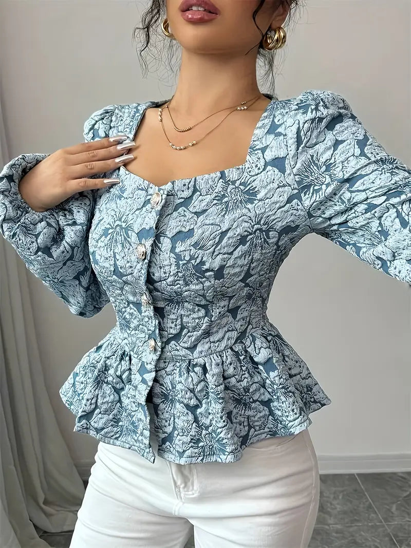 Stella – Elegante Bluse mit Blumenmuster und Puffärmeln